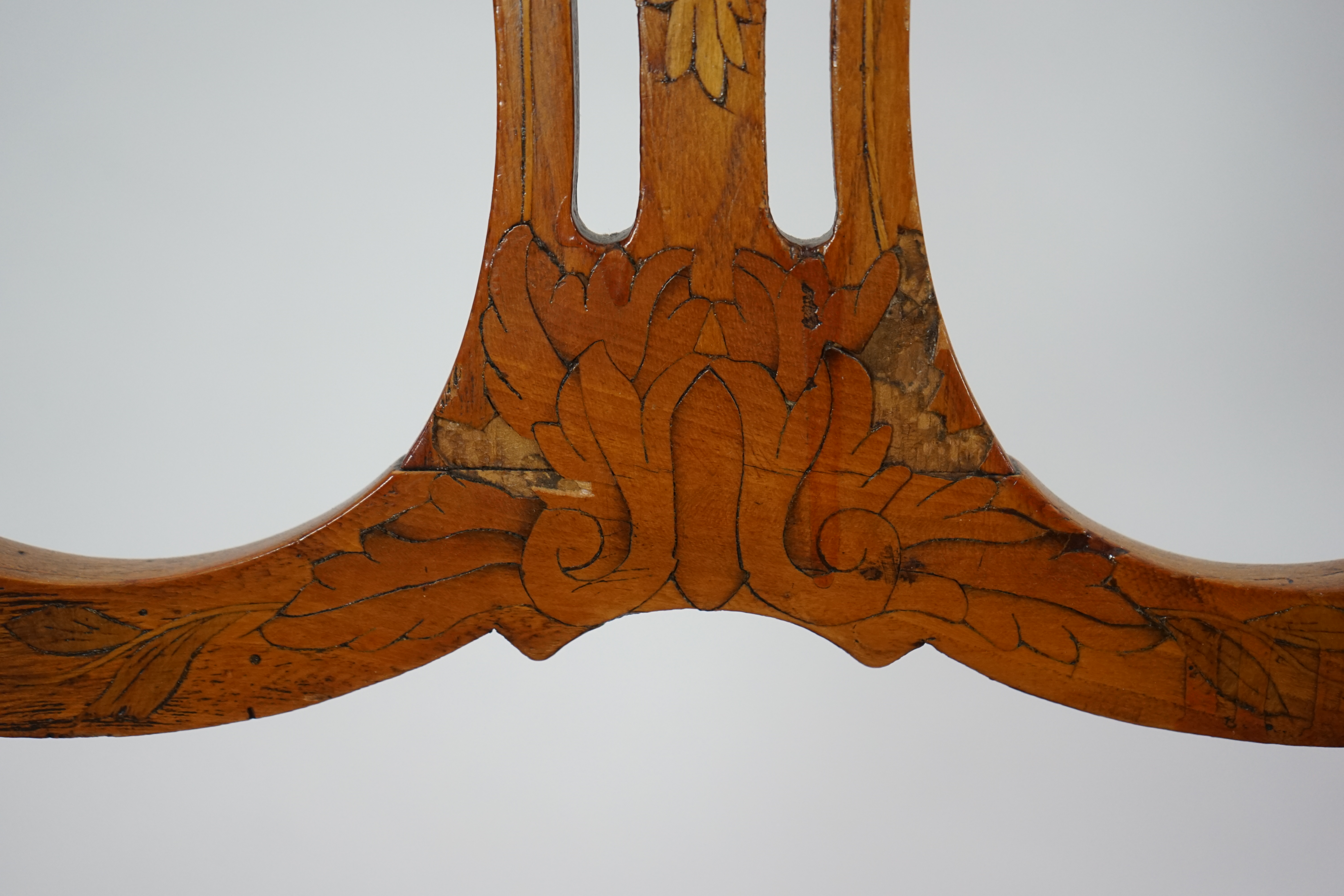 A set of six 18th century Dutch walnut and marquetry dining chairs
